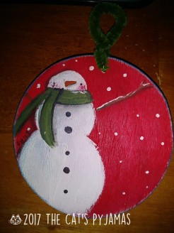 Snowman on red ornament